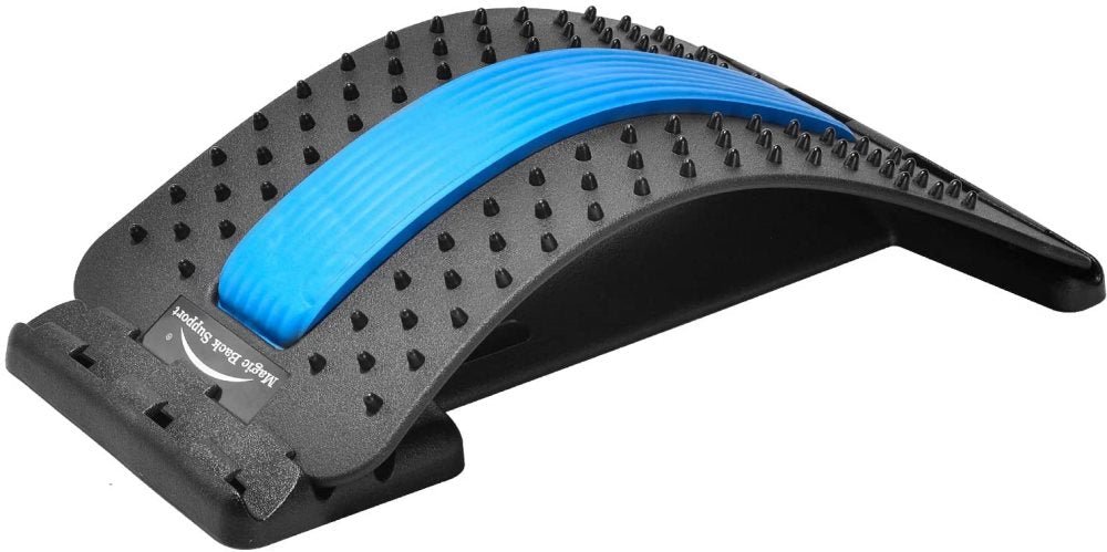 The Fashiongirl Pro Back Stretcher features a black curved plastic design with raised acupressure points and a blue cushioned center strip, delivering lumbar support for posture correction and effective pain relief.