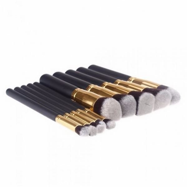 The PRO Makeup Brush Set Black/Gold includes 10 premium kabuki and precision brushes with black handles, gold ferrules, and soft bristles, arranged neatly in a row on a white background.