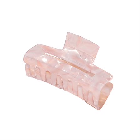 The SOHO Aria Hair Claw - Blush is a translucent pink rectangular acetate hair clip with interlocking teeth and a curved design, shown against a white background.