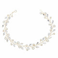 SOHO Emana-hoofdband met kristallen bloemblaadjes - Goud - Haaraccessoires | Fashiongirl