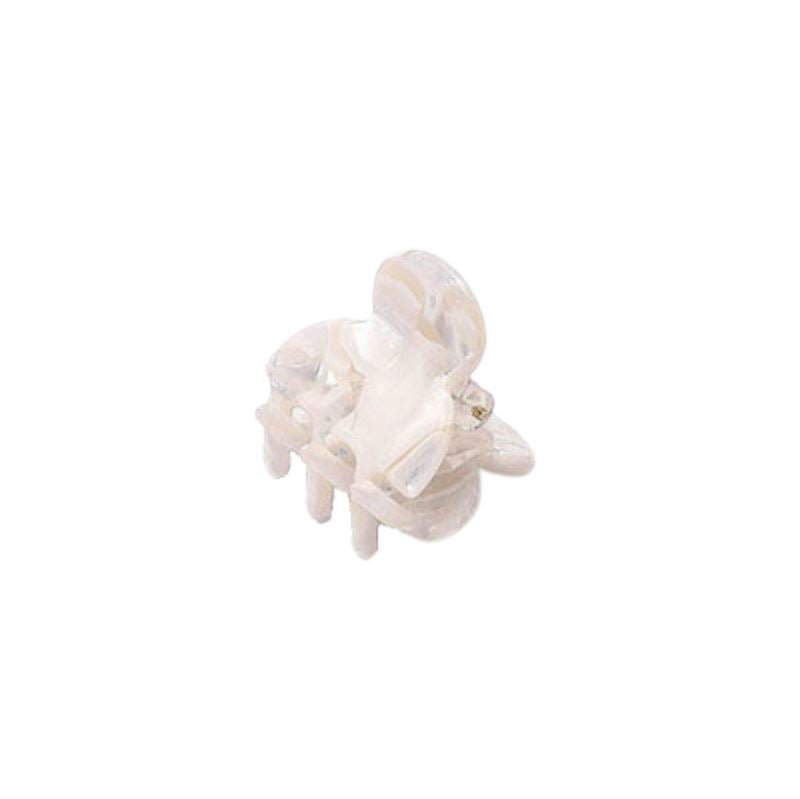 The SOHO Hara Mini Hair Claw - Porcelain by SOHO is a small, transparent plastic hair accessory resembling a mini claw, isolated on a white background.