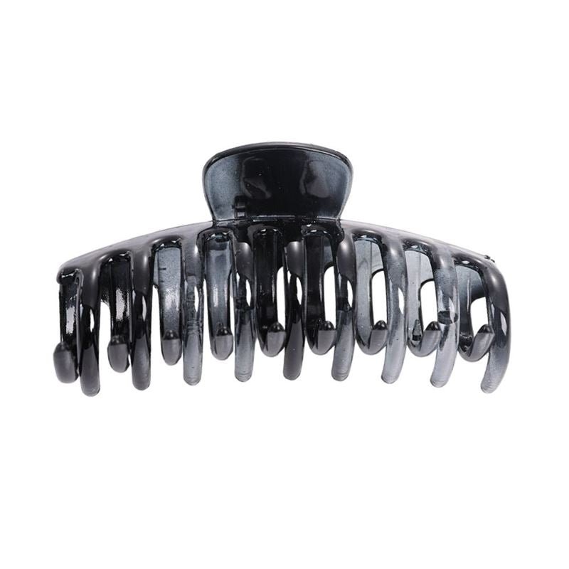 The SOHO Kana Hair Claw - Monotone Gradient by SOHO features curved, interlocking prongs and a spring mechanism, offering a strong grip for all hair types to securely hold hair in place.