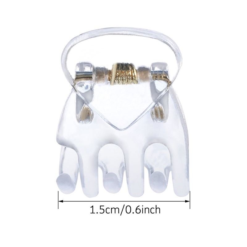 The SOHO Lucca Mini Hair Claws - Transparent by SOHO feature five rounded prongs, a gold-toned spring, and measure just 1.5 cm (0.6 in) wide—perfect for fans of mini or clear hair clips.
