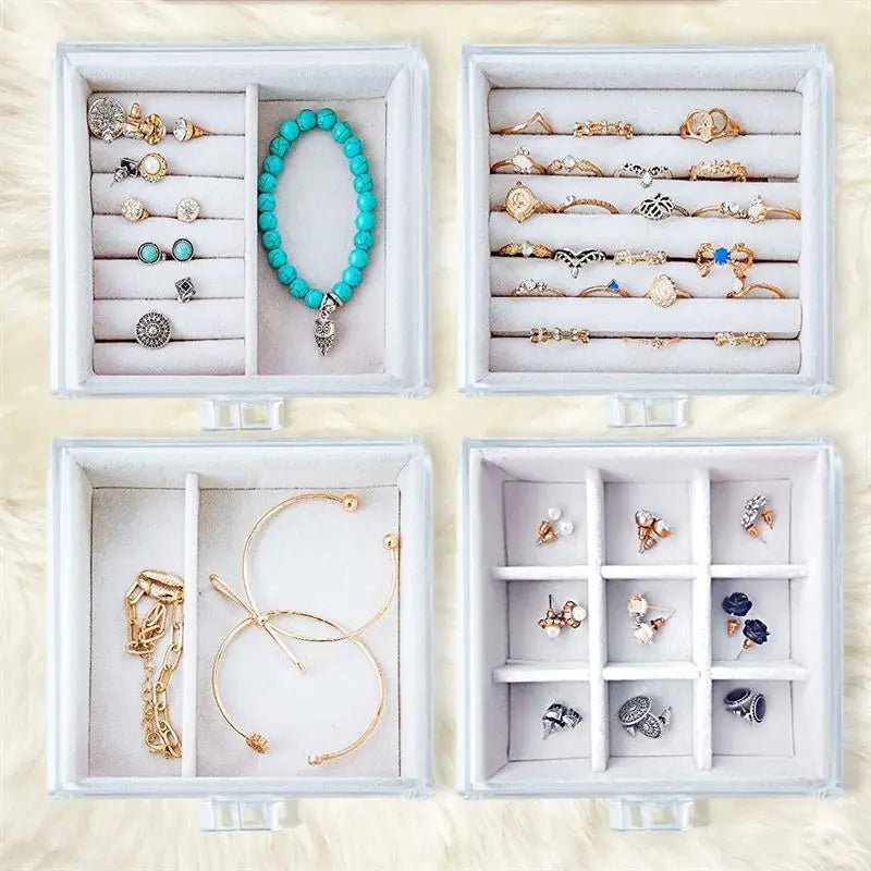 The UNIQ Acrylic Jewellery Organiser (SF 1142) features four velvet-lined drawers and two earring holders, perfect for neatly storing rings, earrings, bracelets, and necklaces in separate compartments.