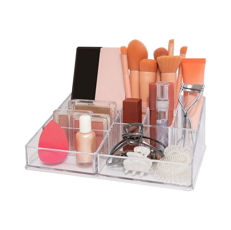 The UNIQ Make Up Acrylic Organiser - SF-1611D (U304) keeps brushes, sponges, bottles, palettes, and jewellery neatly sorted in separate compartments for easy access and tidy storage.