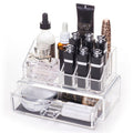 De UNIQ Makeup Acrylic Organiser met 1 lade + bovenkant van UNIQ biedt ruimte voor het netjes opbergen van parfums, lippenstiften, huidverzorgingsflesjes en kleine beautyartikelen, met een onderste lade voor extra opbergruimte.