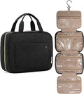 De UNIQ Travel Toiletry Bag in zwart heeft 4 waterdichte compartimenten, een ophanghaak en handvatten. Deze organizer van UNIQ wordt gesloten en open getoond, waardoor de transparante vakken met ritssluiting zichtbaar zijn – ideaal voor op reis.